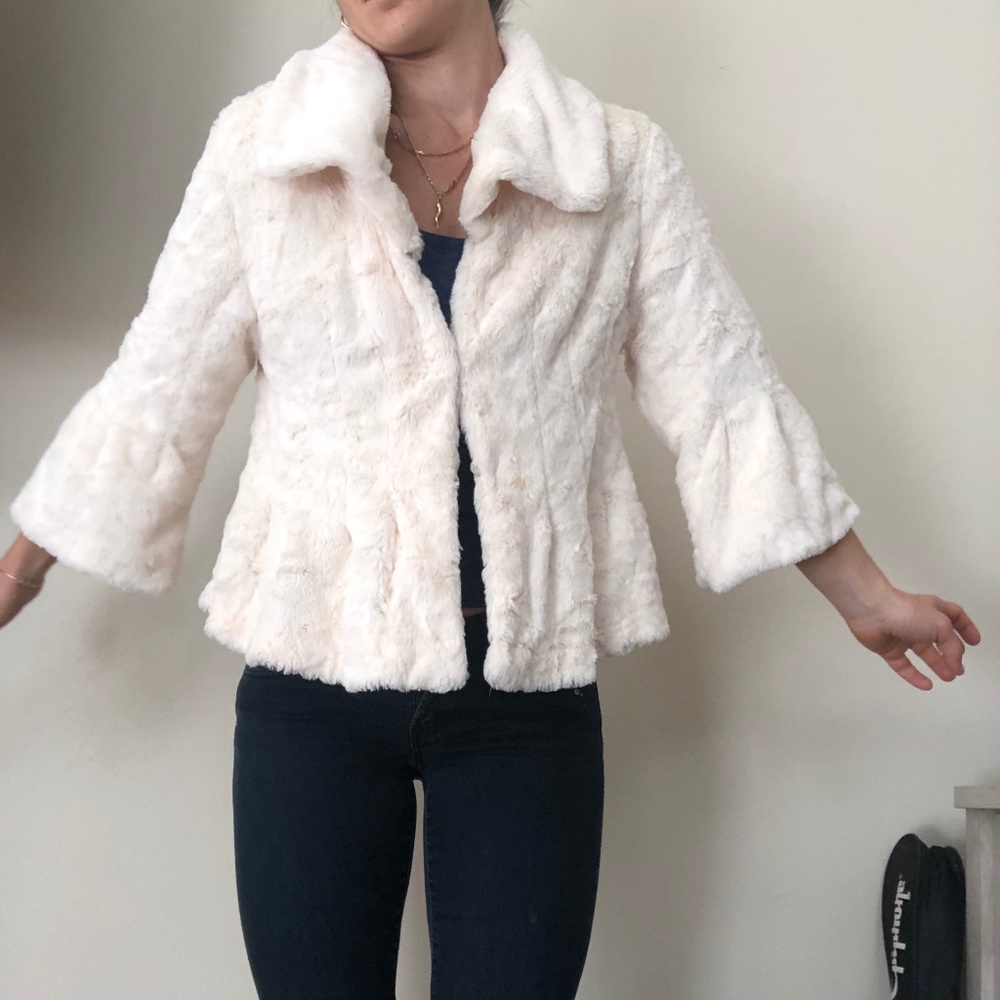 White faux fur coat